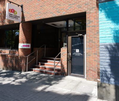 Entrance Intercultural Association Building Brick Facade Stairs Entrance to the Inter-Cultural Association building with brick facade and stairs.