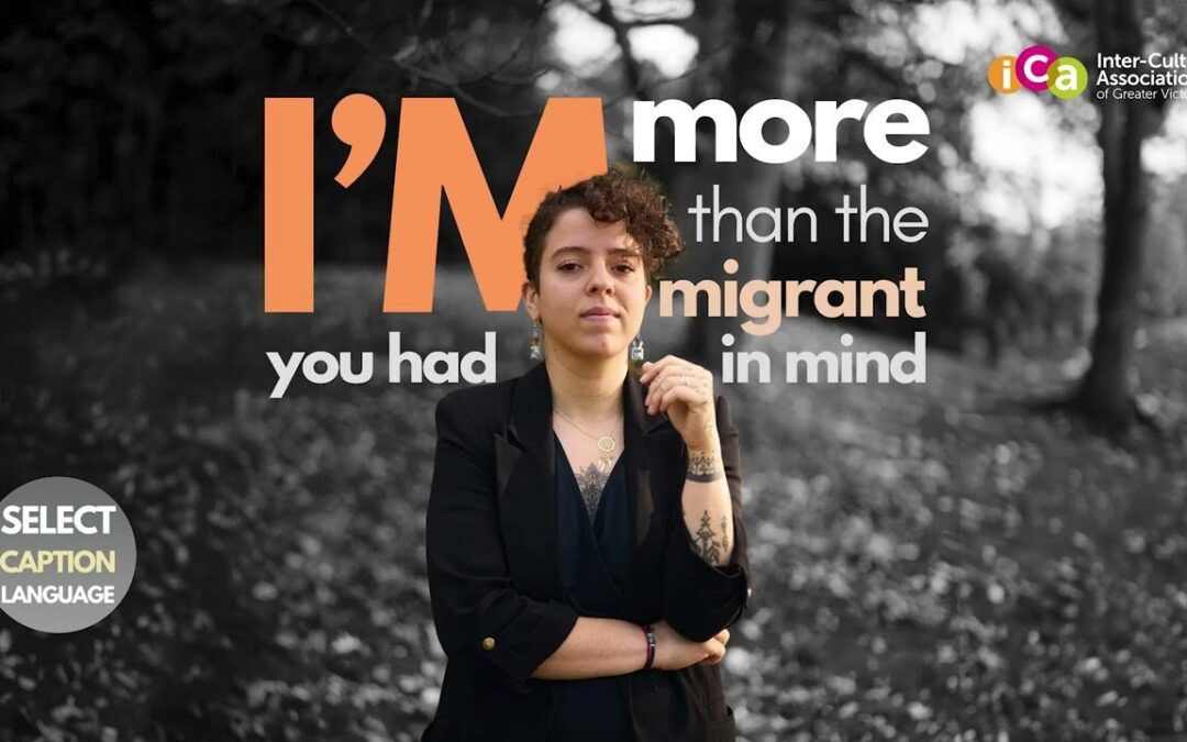 A person with curly hair and tattoos is shown in front of text that reads "I'm more than the migrant you had in mind.